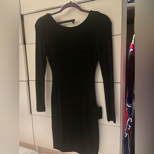 Lulu’s black school back dress. Black with silver shimmer throughout. NWT.